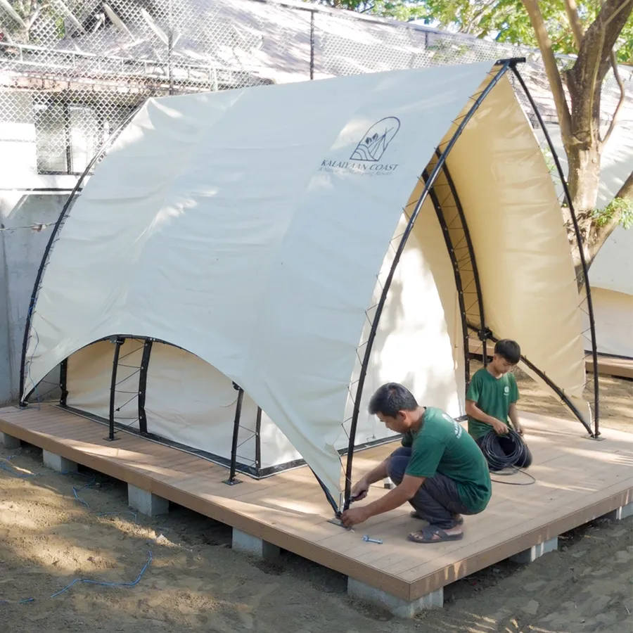 A Solora A-frame glamping tent being assembled at Batangas Kalaiyaan